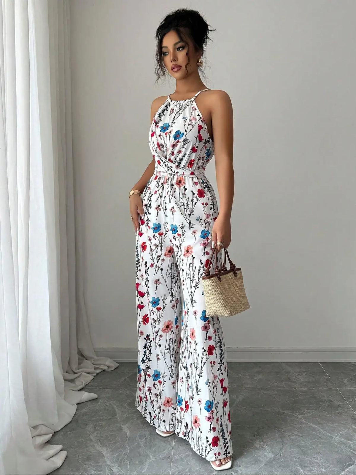Bloemenprint Halter-jumpsuit met Strikceintuur Venzali