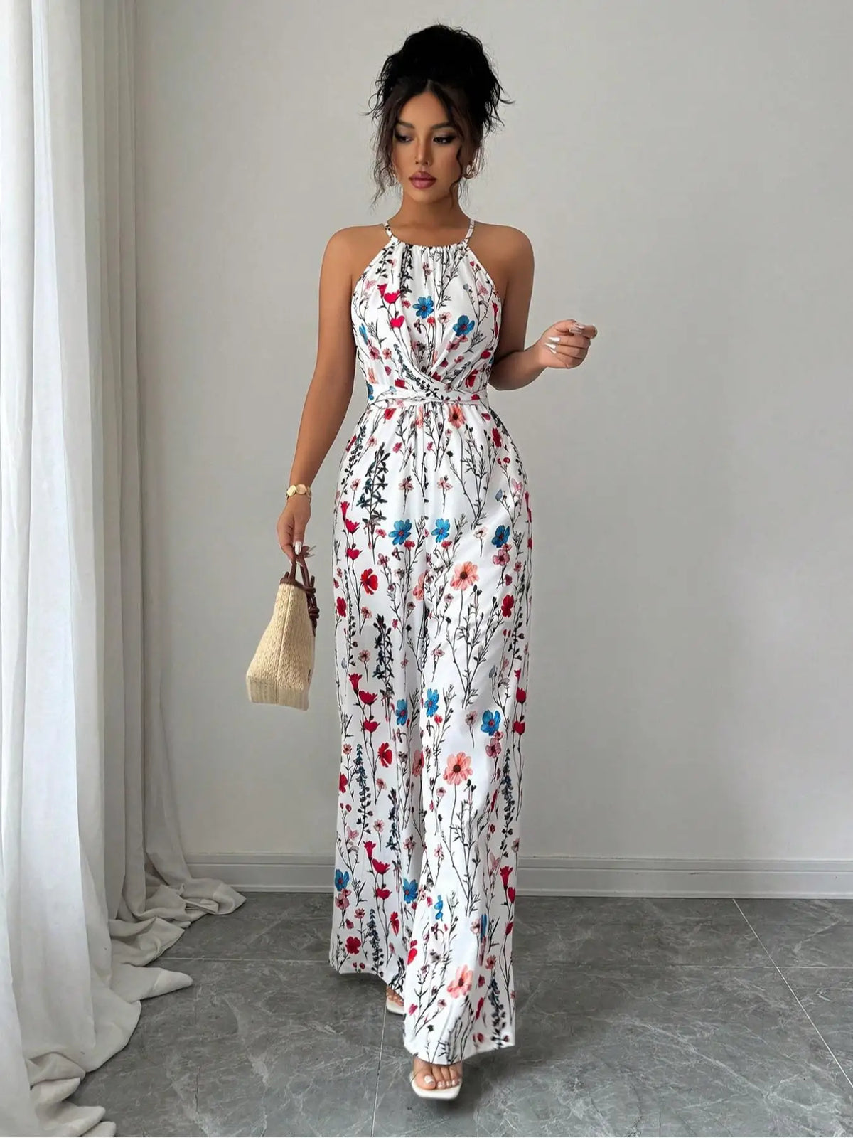 Bloemenprint halternek maxi jumpsuit met wijde palazzo-pijpen Wit Venzali